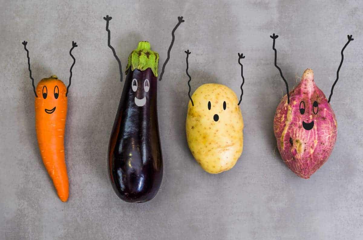 Potato, Sweet potato, Carrot, Eggplant placed on a flat surface