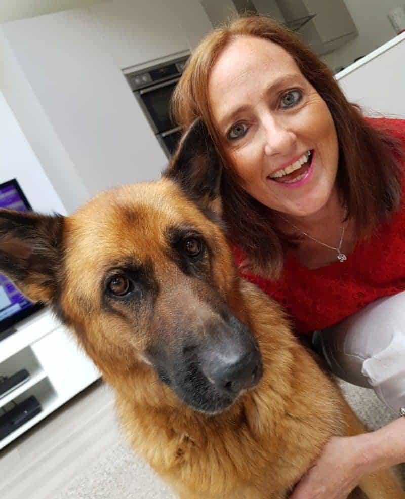 A photo of Sharon Waddington with her GSD Willow
